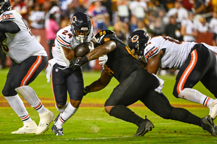 Washington Commanders defensive tackle Daron Payne and Chicago Bears running back Khalil Herbert